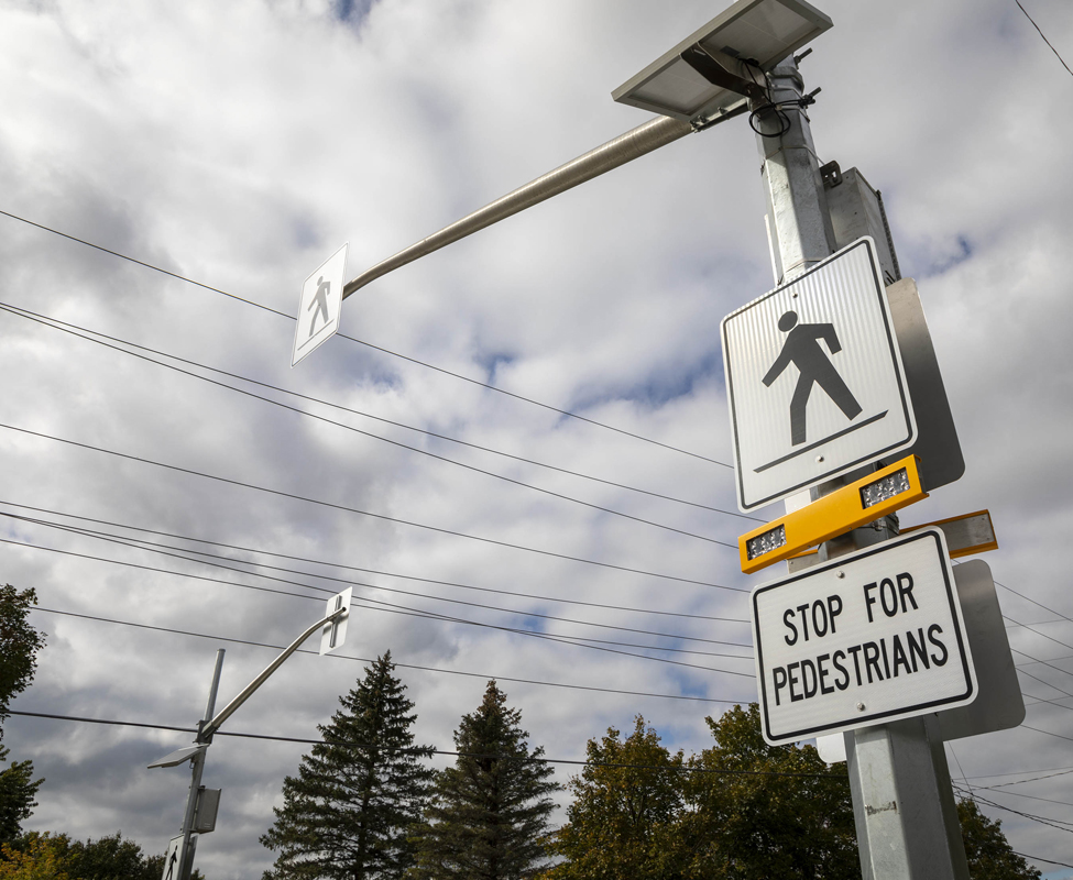 pedestrian crossover signal and sign