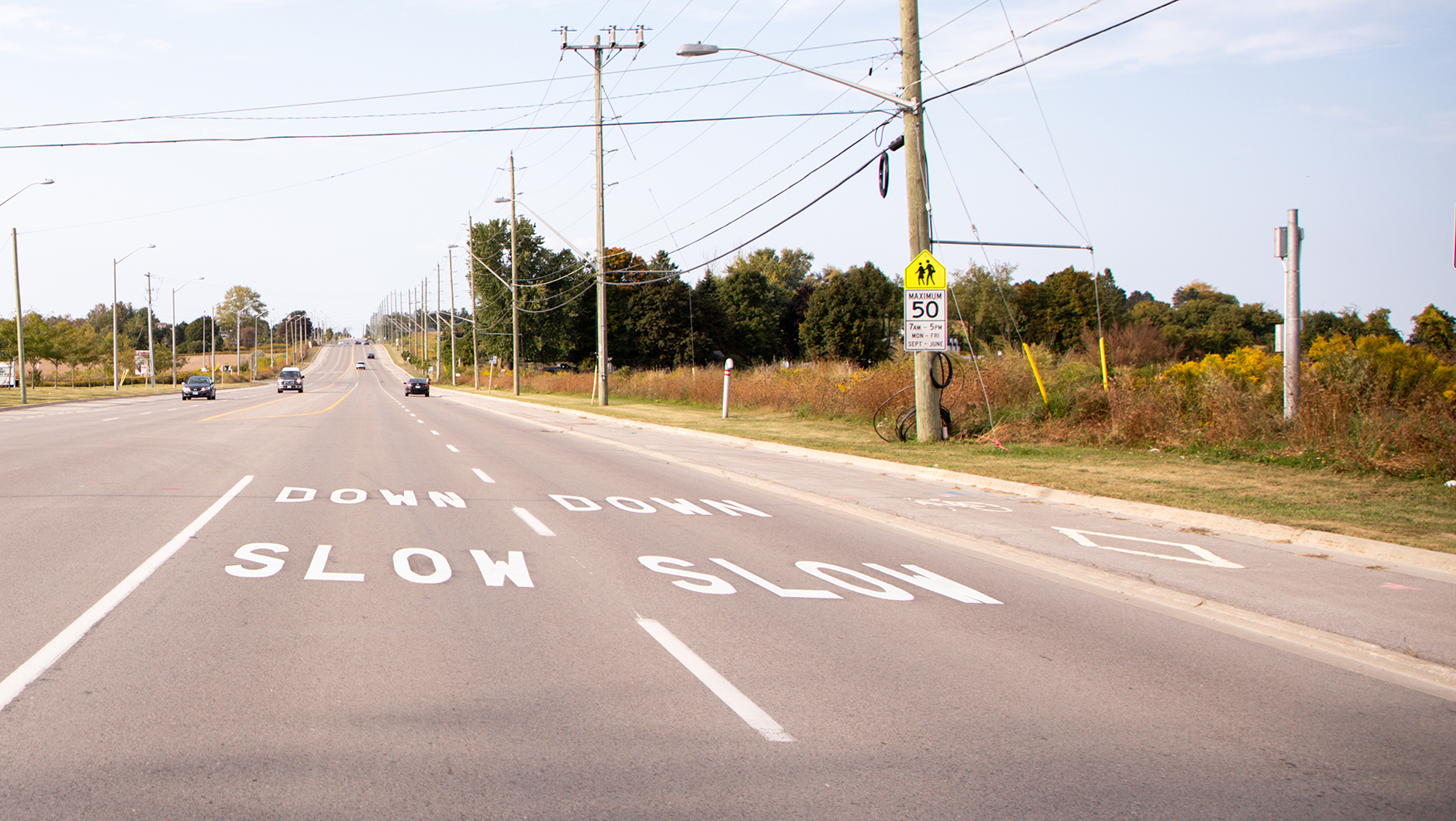Slow Down Pavement Markings