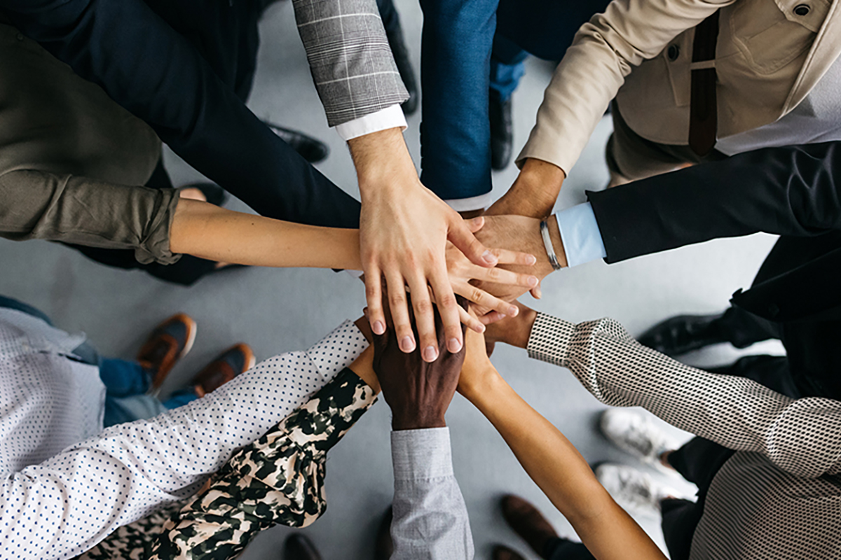 Careers Inclusive Workplace Group of hands in a circle
